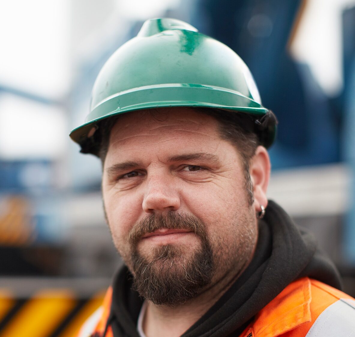 Portrait of engineer at wind farm